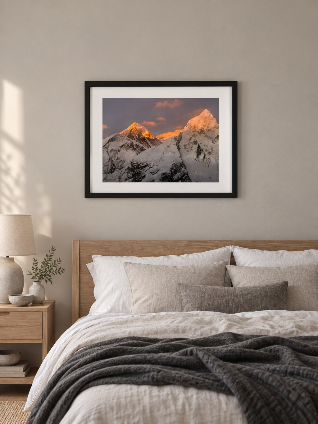 Room mockup of Elevation above a bed in a softly lit bedroom.