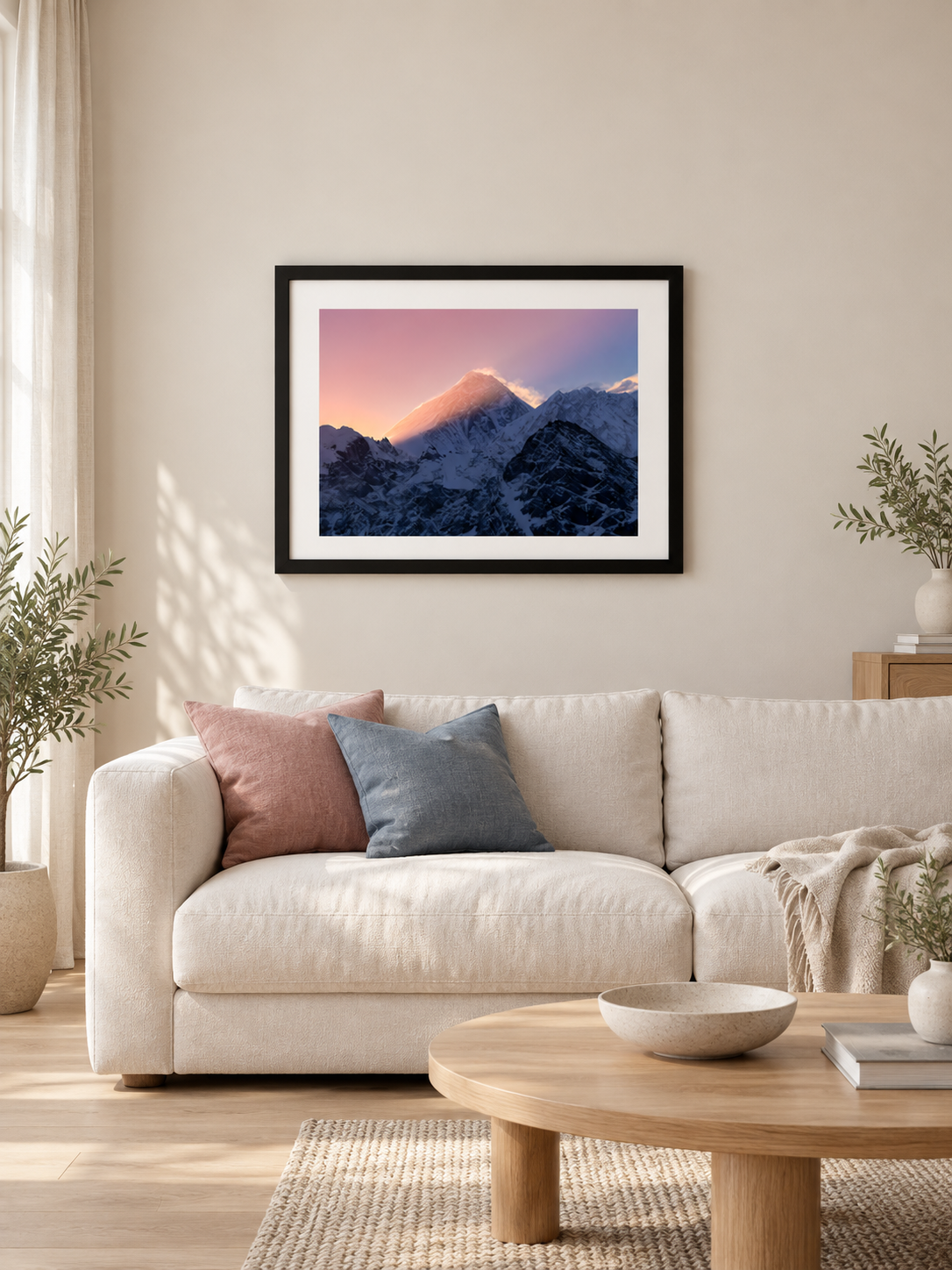 Room mockup of Flame above a cream sofa.