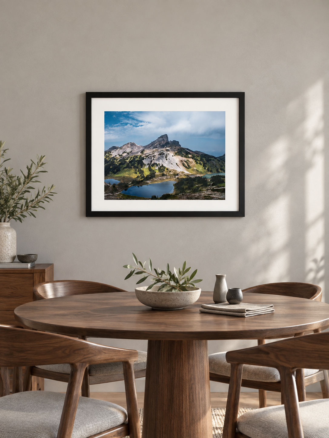 Room mockup of Tusk above a round wooden dining table.