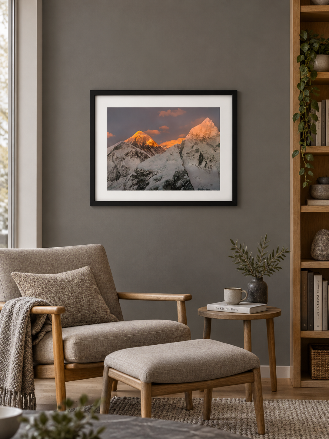 Room mockup of Elevation above an armchair and footstool.