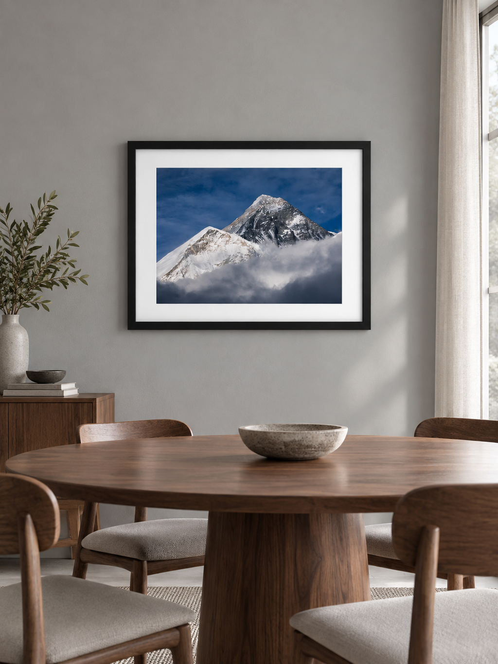 Room mockup of Emergence above a round wooden dining table.