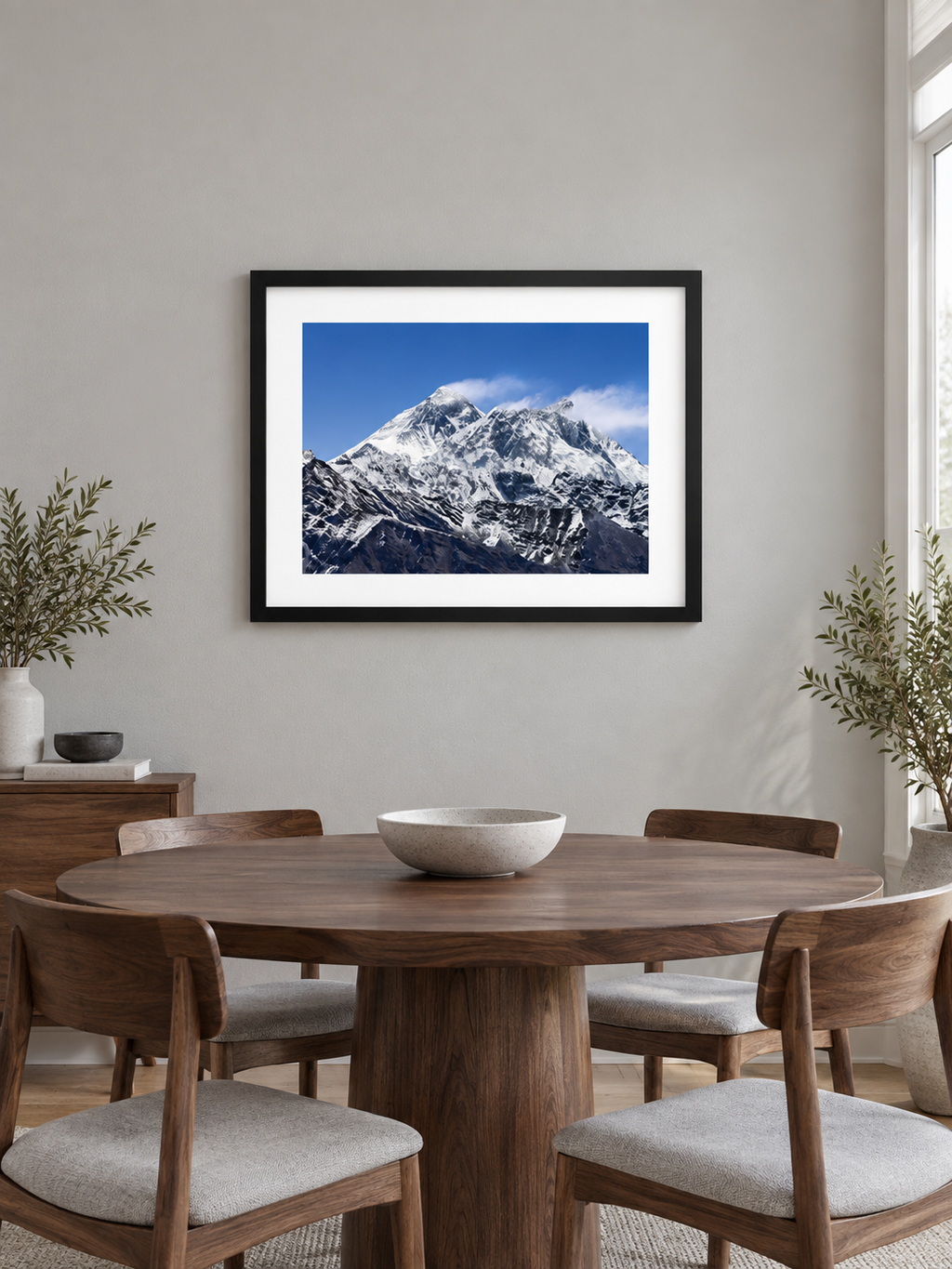Room mockup of Silence above a round wooden dining table.